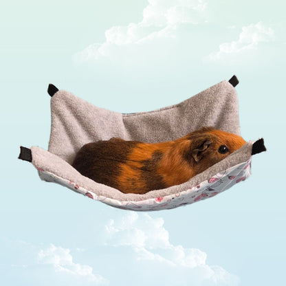 Handmade Reversible Snuggle Hammock for Small Animals - Blue Feathers and Grey with a guinea pig laying