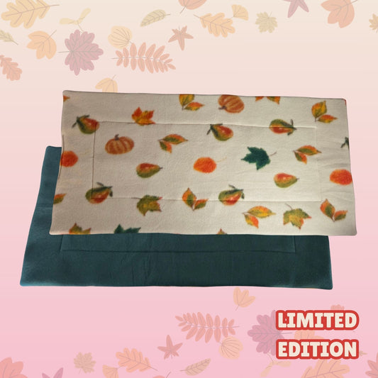 Handmade large 35x70cm guinea pig pee pad with autumn leaves print and dark emerald green backing