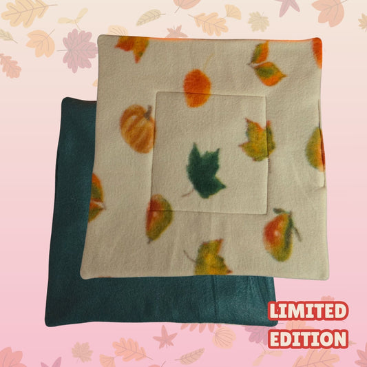 Handmade medium 33x33cm guinea pig pee pad with autumn leaves print and dark emerald green backing