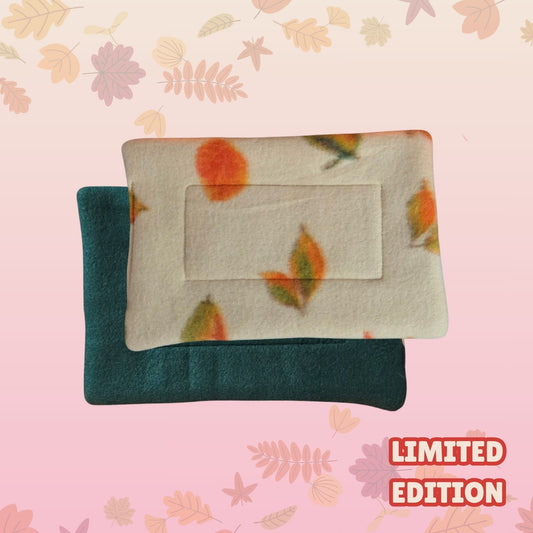 Handmade small 17x25cm guinea pig pee pad with autumn leaves print and dark emerald green backing